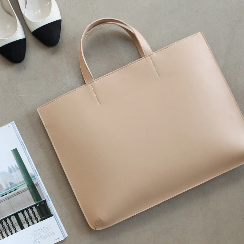 Tassima ol kaubanduslik büroo kohvris on sülearvuti kott naiste käekott