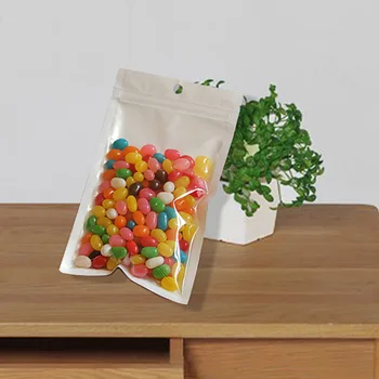 300pcs Valge läbipaistev isetihenev lukuga kott plastpakendid Pearl film kotid on korduvkasutatavad ladustamise kott Riputada Auk